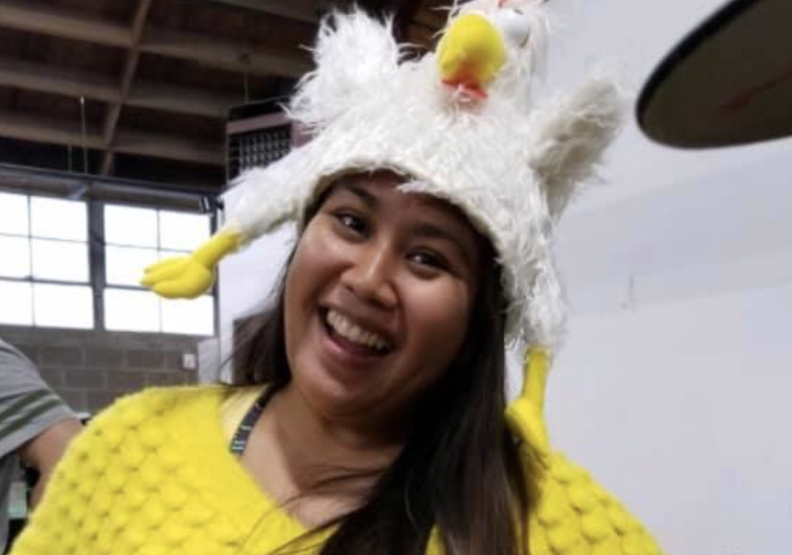 Janika wearing a chicken hat